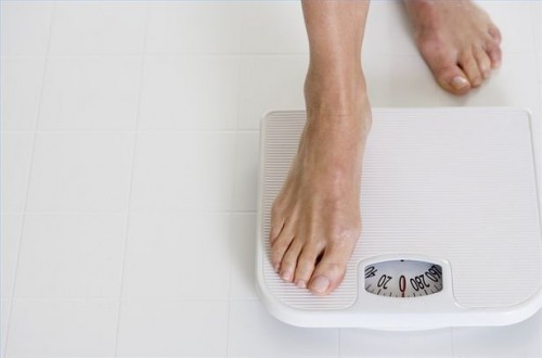 Hvordan å miste vekt med Belly Fat Cure Diet